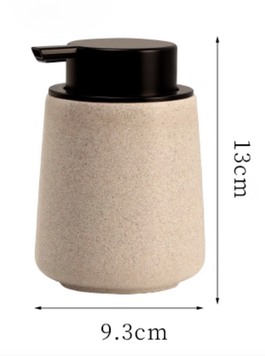 Beige ceramic soap dispenser β Simple Palette Singapore