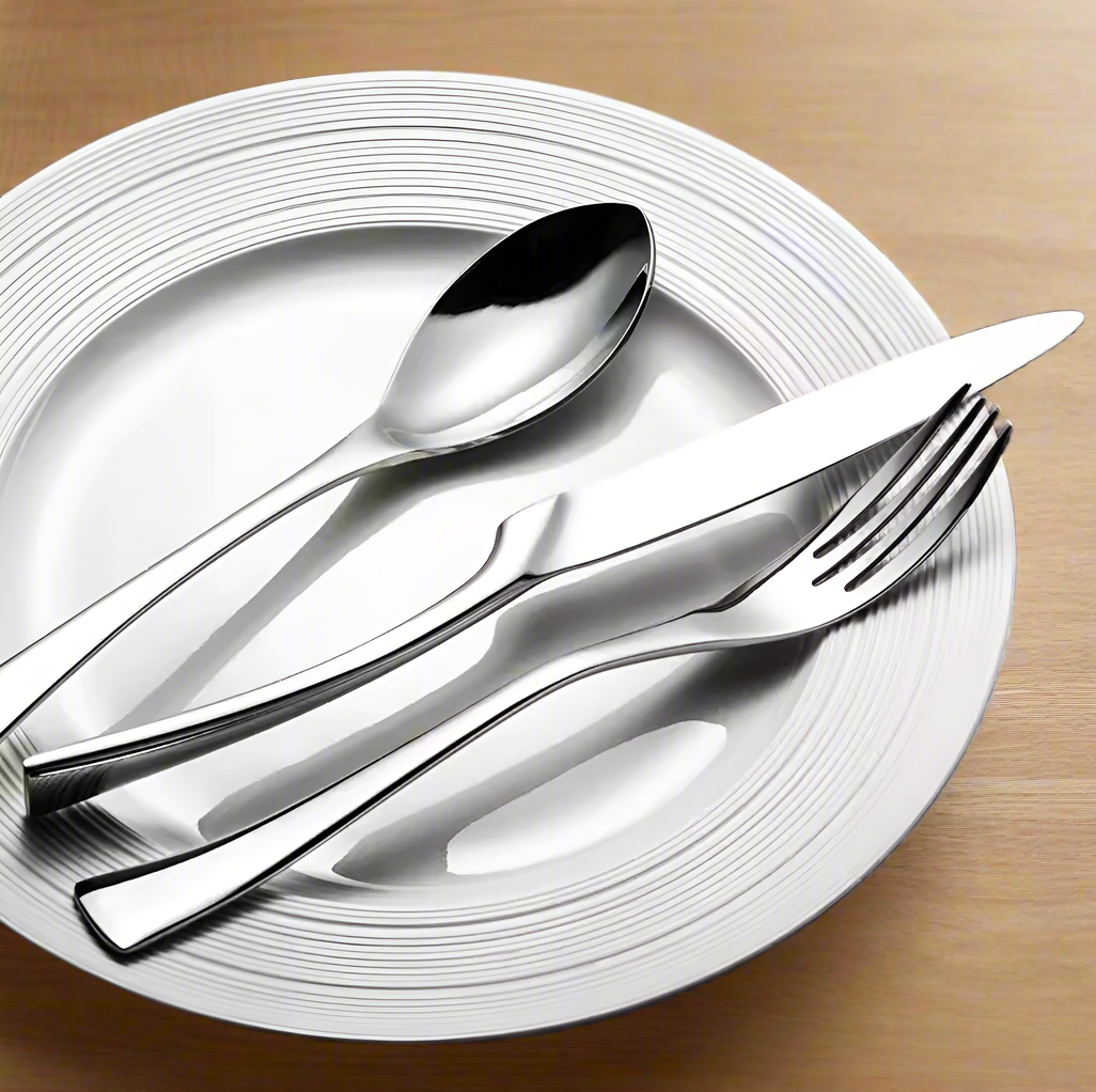 Stainless steel fork and knife set with sleek finish - handcrafted cutlery for fine dining