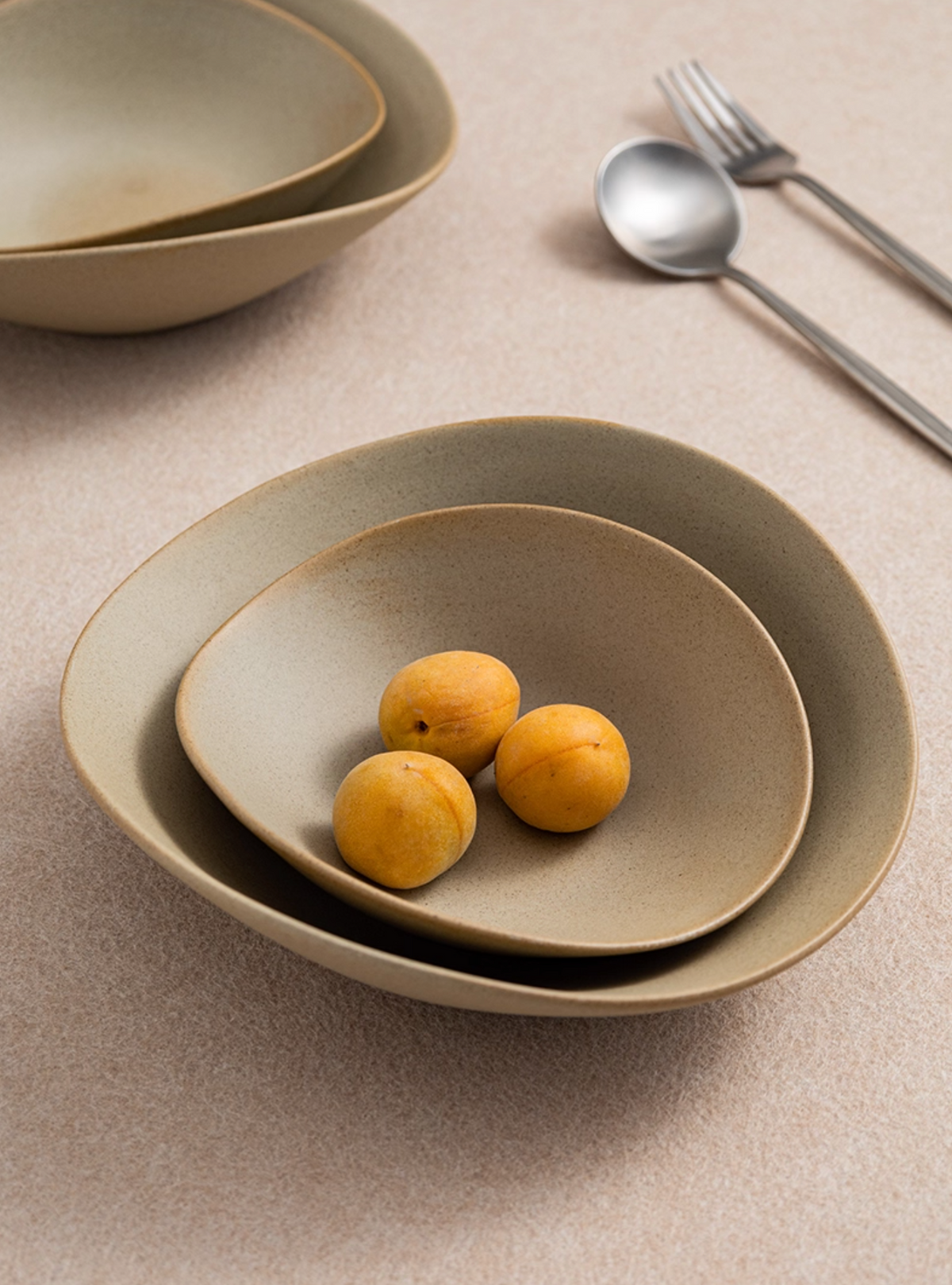 Clay Series tan deep plate with organic shape, photo 6 – Simple Palette Singapore