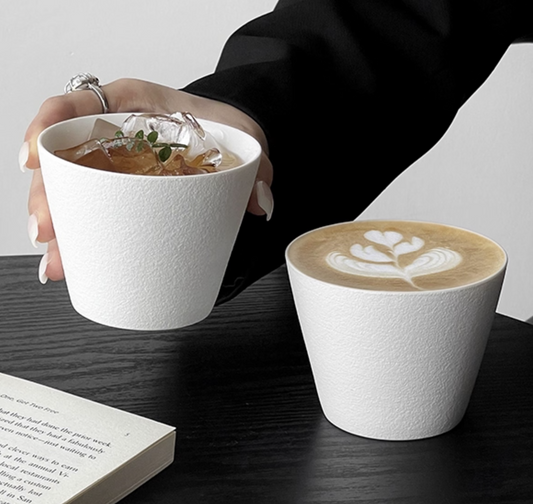 Artisan coffee cup side view showing ceramic craftsmanship