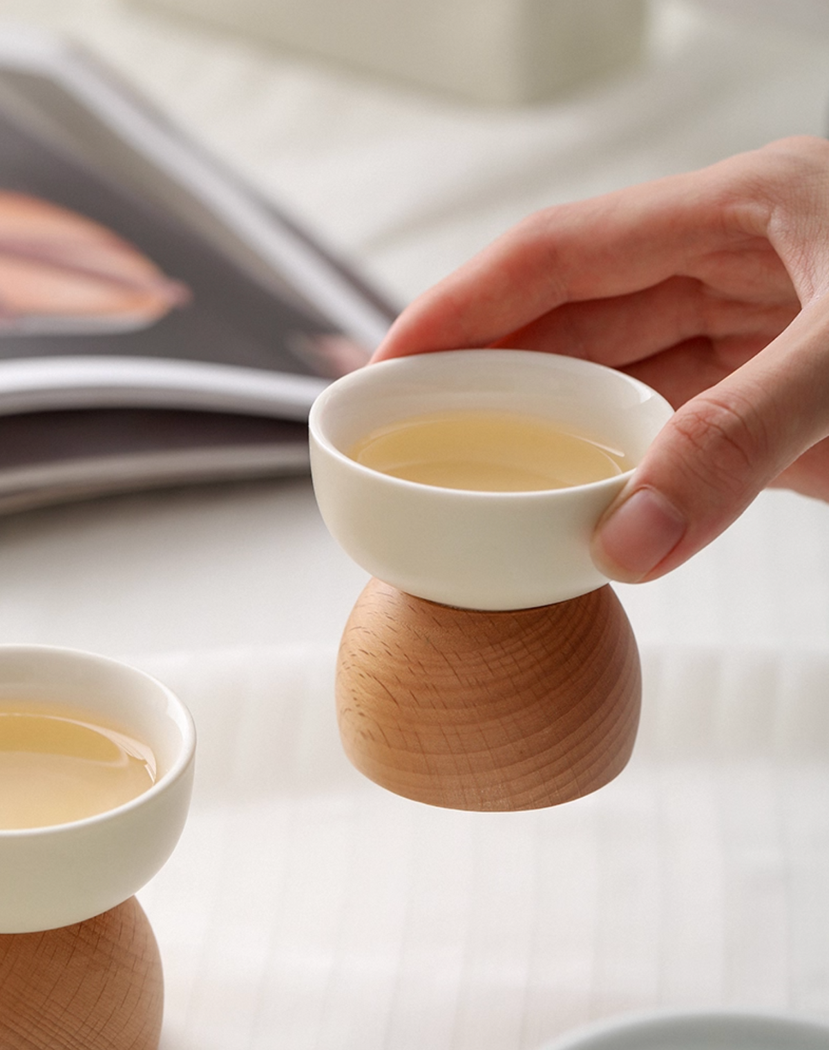 Detail view of Wabi Sabi tea cup handle showing artisanal ceramic craftsmanship